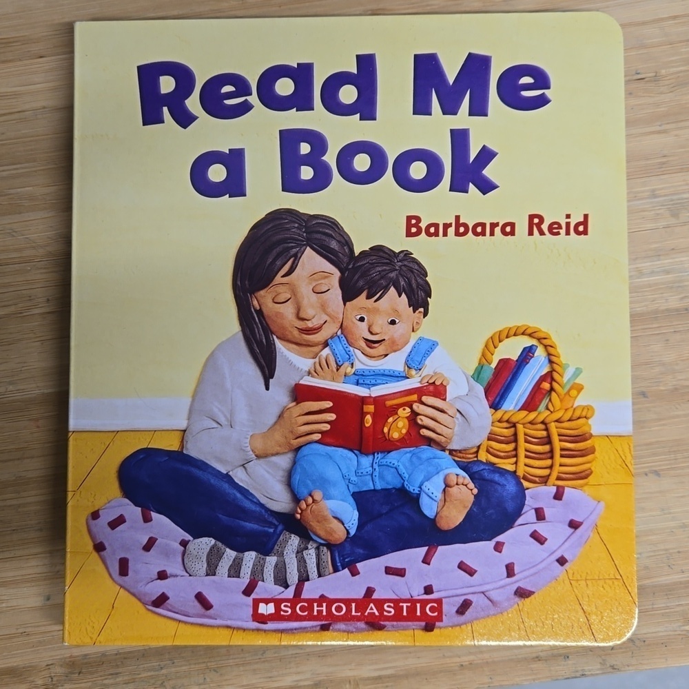 Board book - Read me a book - Barbara Reid, euc